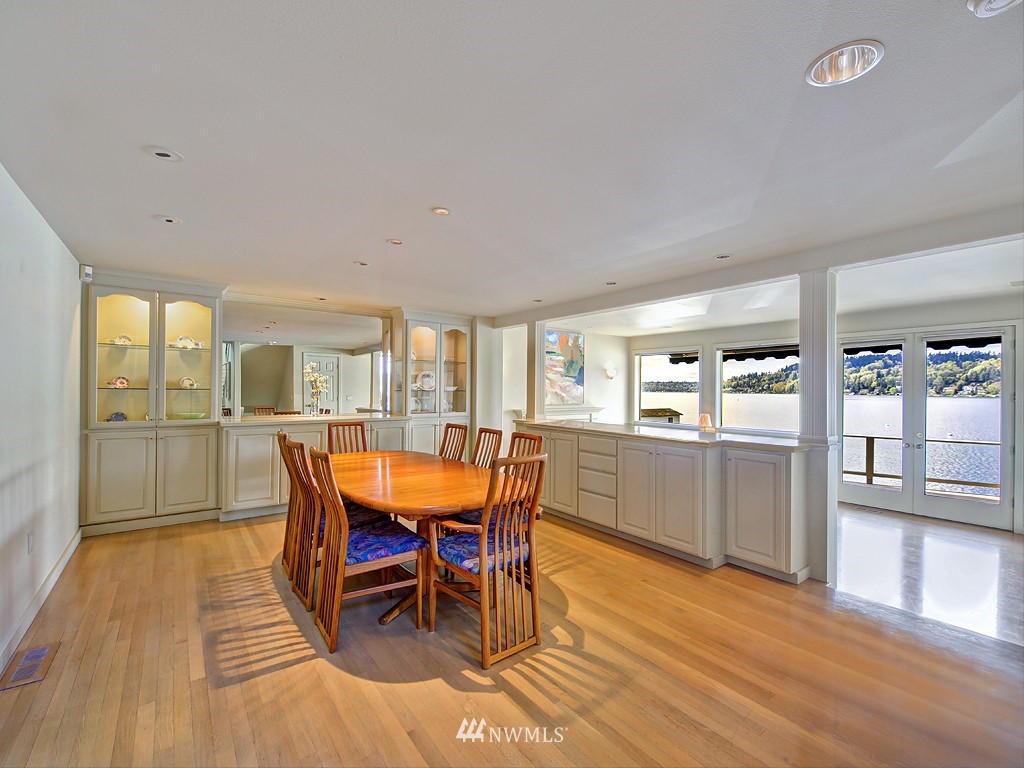 7023 Ripley Lane North Renton, WA 98056 - Photo 5 of 15 a dining room with furniture and wooden floor