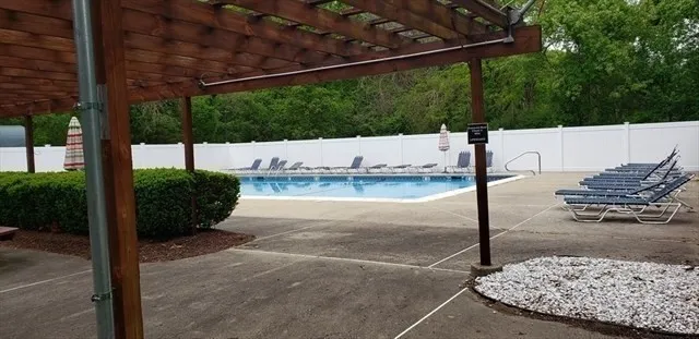 a view of a backyard of the house