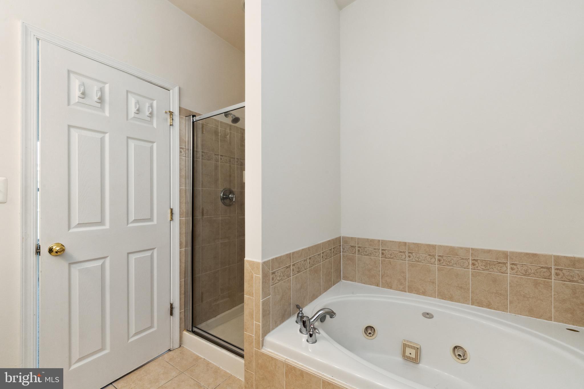 17 South Exeter Street, Unit 161 Baltimore, MD 21202 - Photo 20 of 27 a bathroom with a bathtub