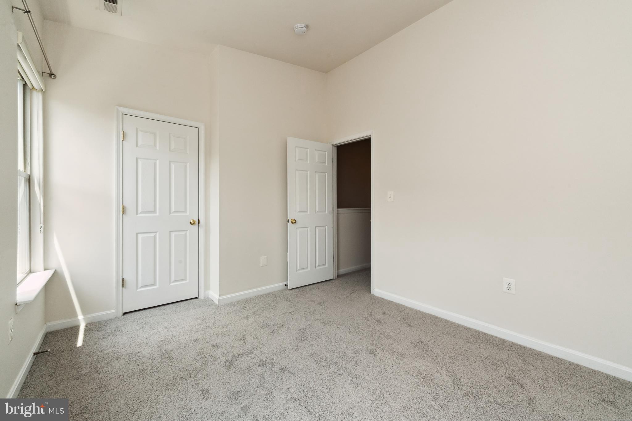 17 South Exeter Street, Unit 161 Baltimore, MD 21202 - Photo 22 of 27 an empty room with windows