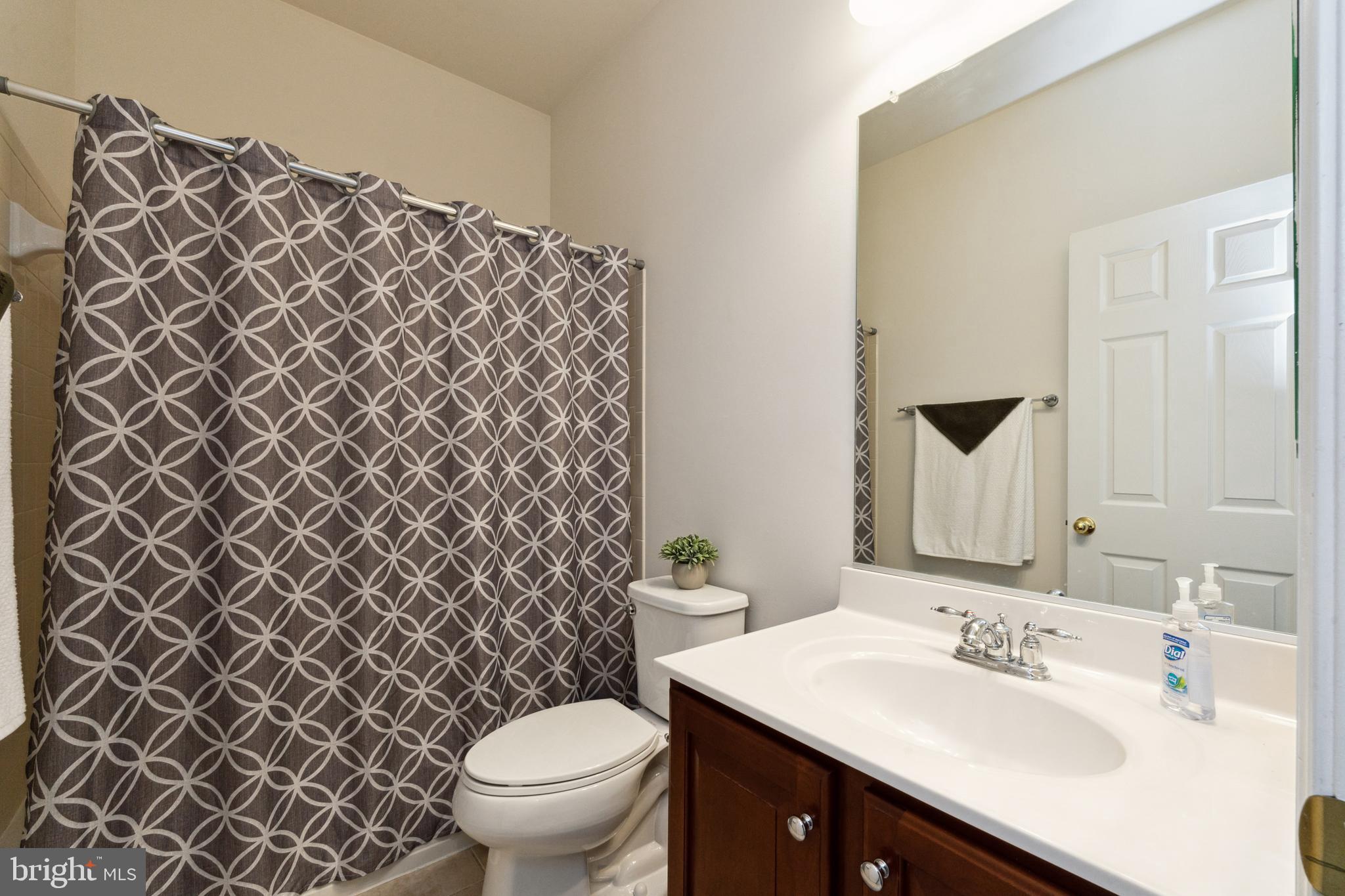 17 South Exeter Street, Unit 161 Baltimore, MD 21202 - Photo 23 of 27 a bathroom with a sink and a toilet