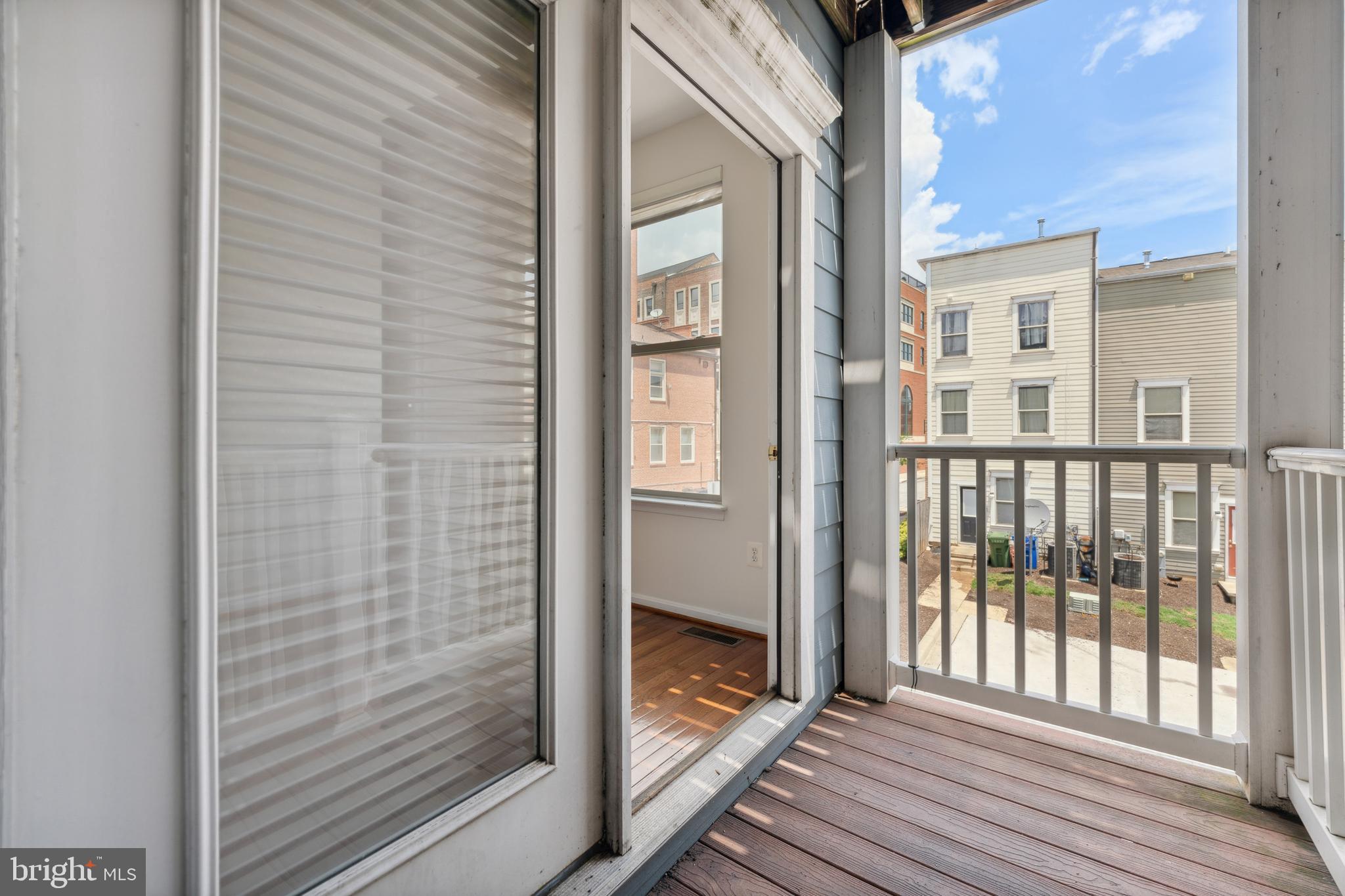 17 South Exeter Street, Unit 161 Baltimore, MD 21202 - Photo 5 of 27 a view of a balcony from a door