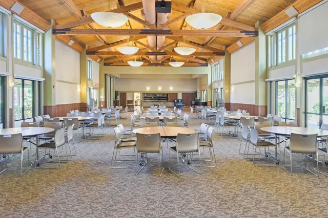 a view of a living room and dining room