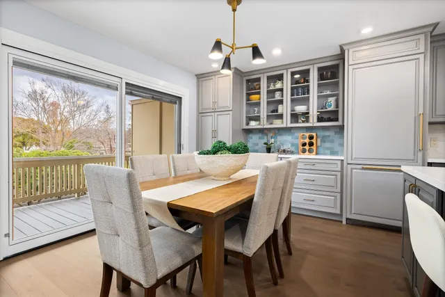 a dining room with furniture window wooden floor