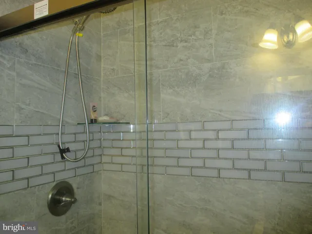 a bed room with a bed and a dresser