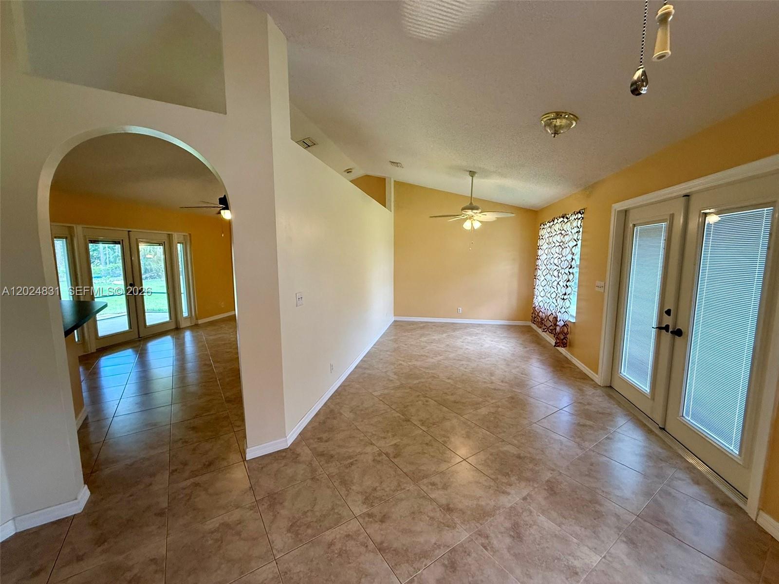 15819 76th Road North Loxahatchee, FL 33470 - Photo 9 of 45 a view of livingroom with hardwood floor and hallway