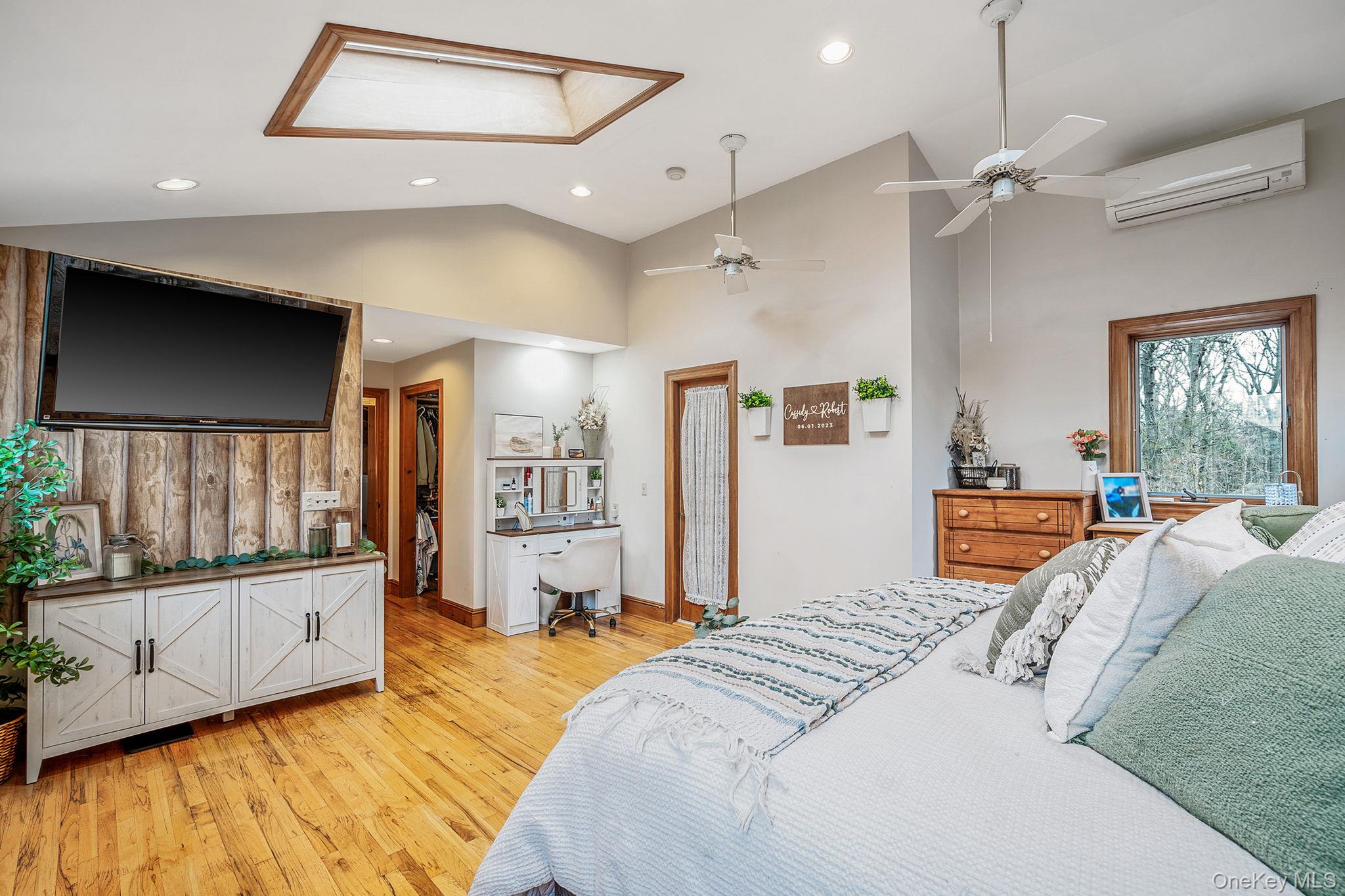 23 Wylde Road Mount Sinai, NY 11766 - Photo 22 of 45 a bedroom with a bed and a large window