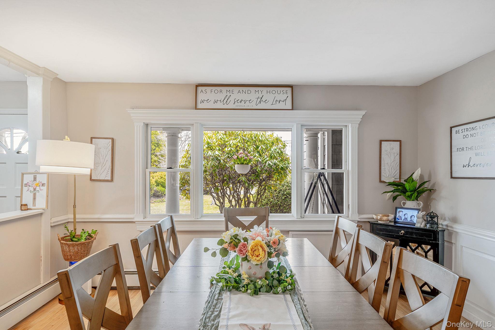 23 Wylde Road Mount Sinai, NY 11766 - Photo 8 of 45 a living room with furniture and a large window