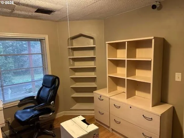 a view of a workspace with furniture