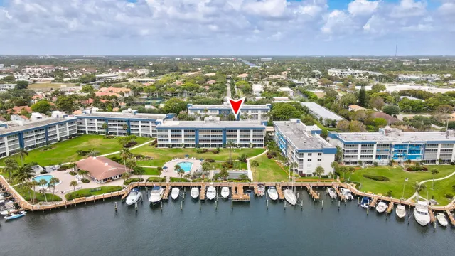 an aerial view of a swimming pool patio swimming pool and outdoor seating