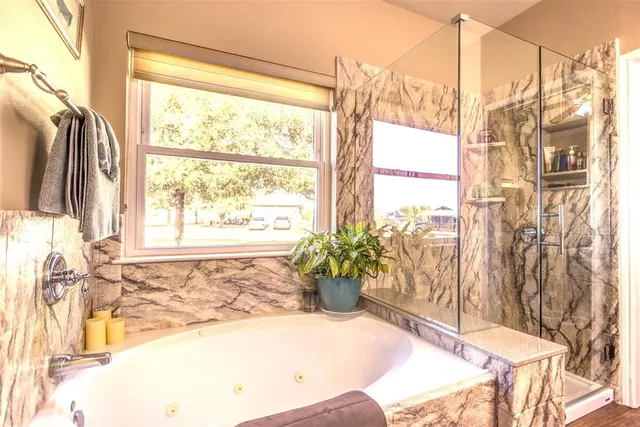 a view of a living room with a large window