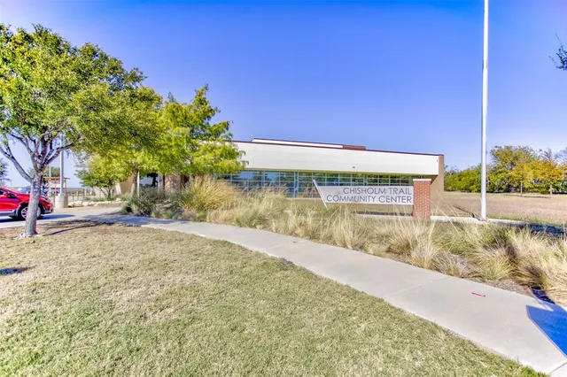a view of a backyard of a house