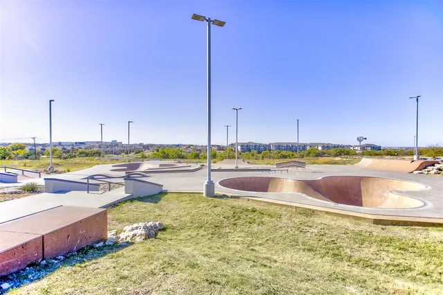 a view of a swimming pool with a lake view