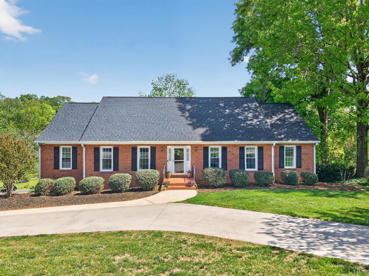 316 Quail Ridge Drive Forest, VA 24551 - Photo 1 of 35 front view of a house next to a yard