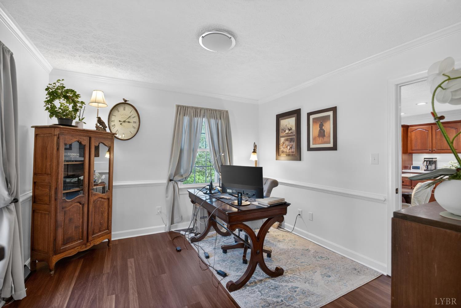 316 Quail Ridge Drive Forest, VA 24551 - Photo 11 of 35 a view of a workspace with furniture and a window