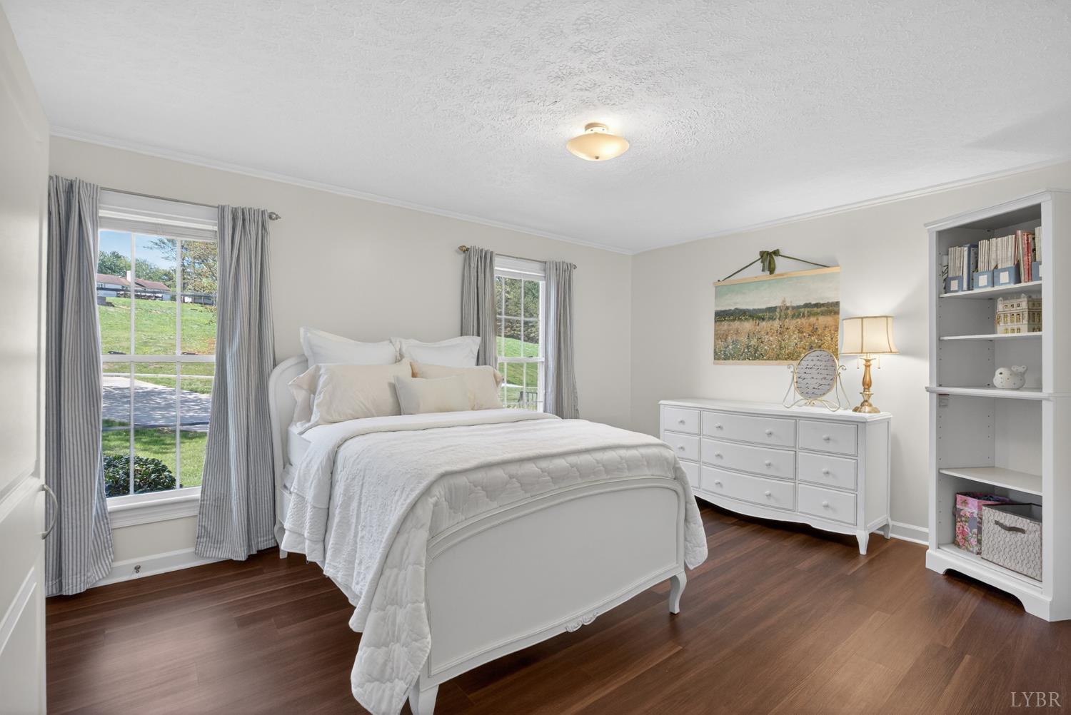 316 Quail Ridge Drive Forest, VA 24551 - Photo 13 of 35 a bed room with a bed and a window