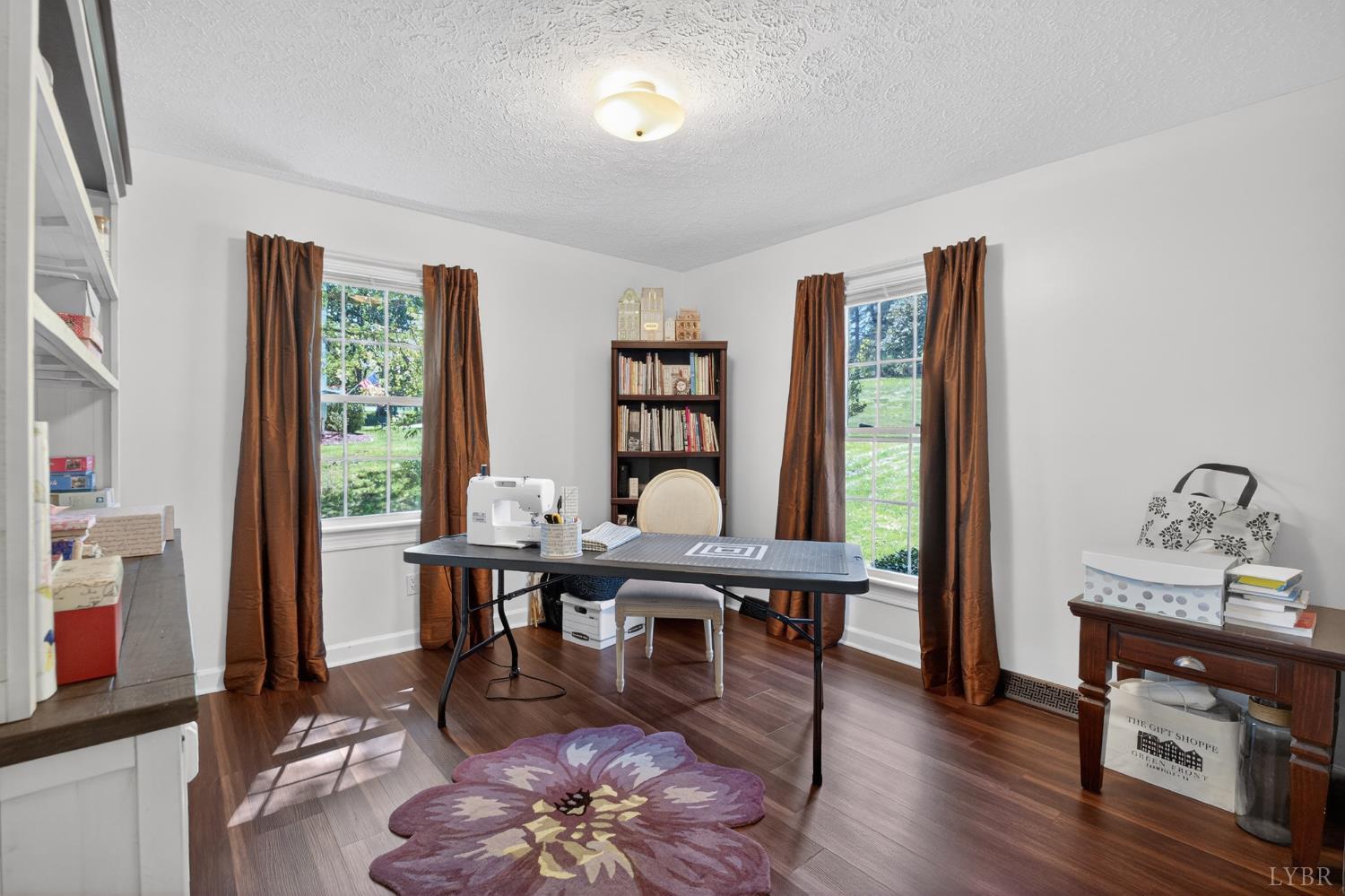 316 Quail Ridge Drive Forest, VA 24551 - Photo 14 of 35 a workspace with furniture window and wooden floor