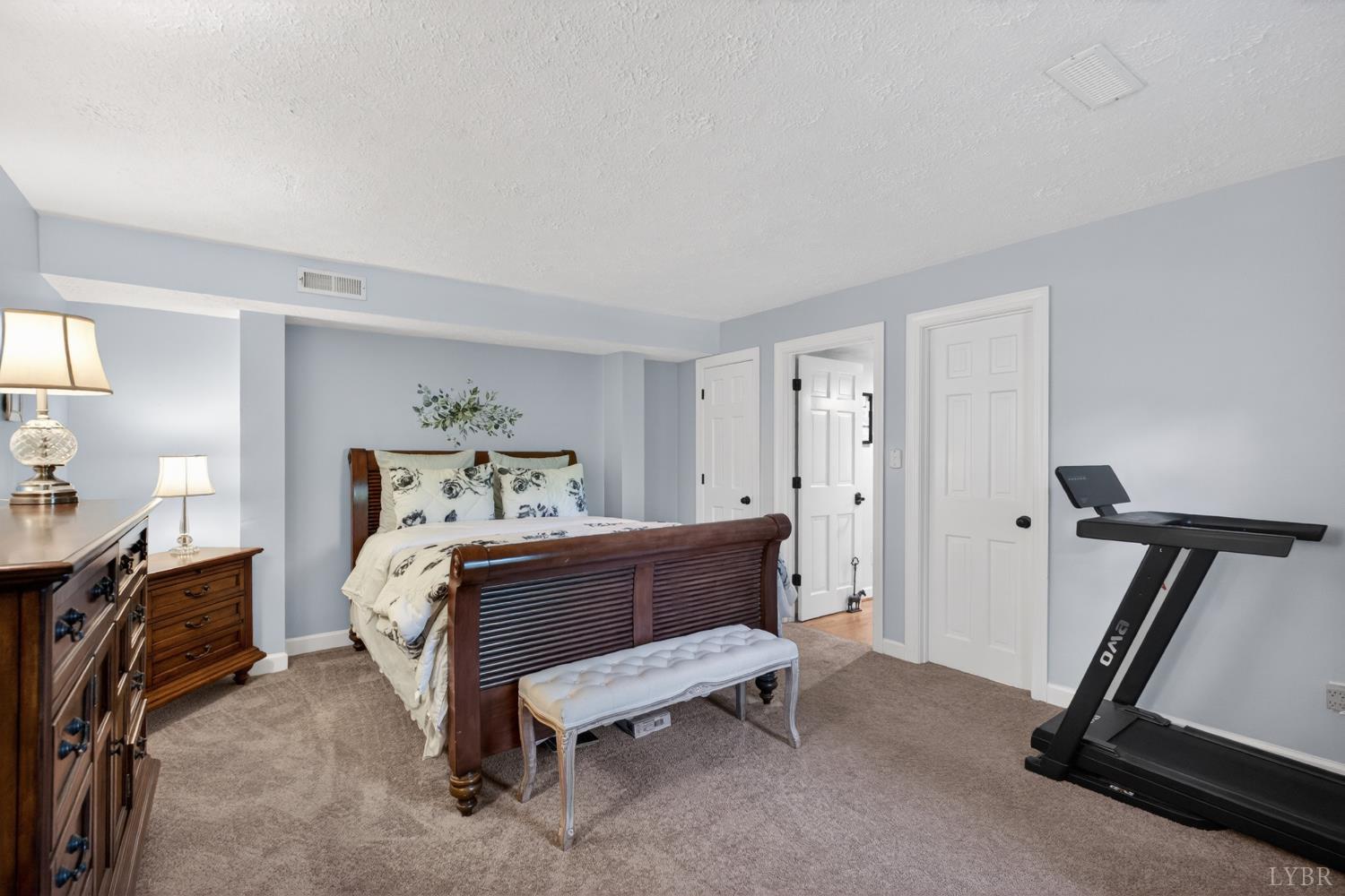 316 Quail Ridge Drive Forest, VA 24551 - Photo 20 of 35 a bedroom with a bed and a window