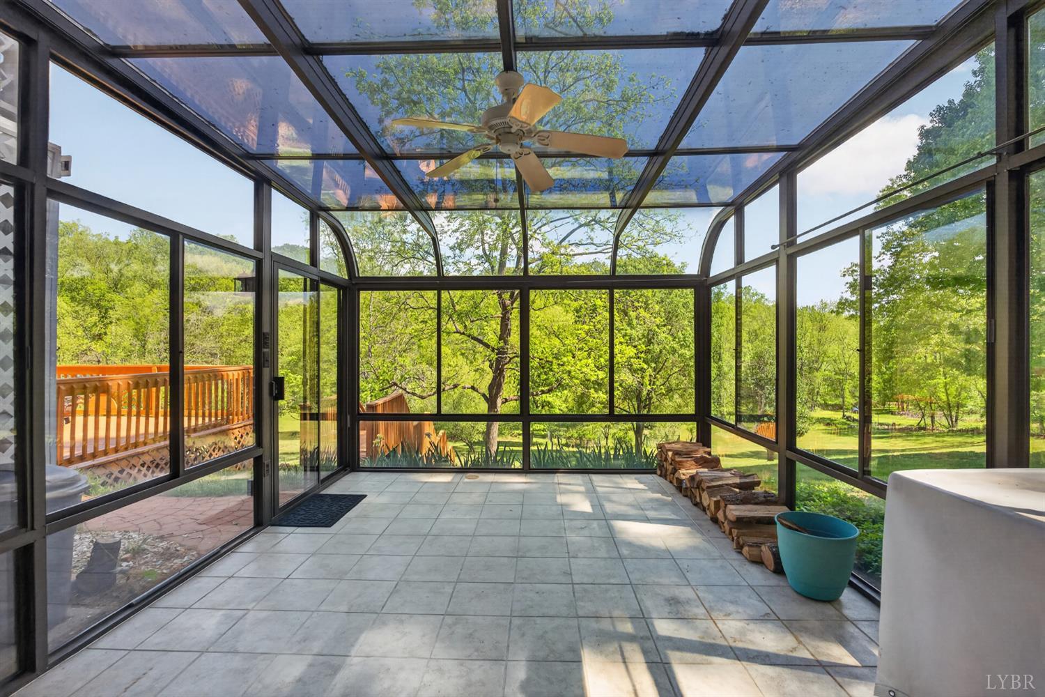 316 Quail Ridge Drive Forest, VA 24551 - Photo 24 of 35 a view of porch with a floor to ceiling window