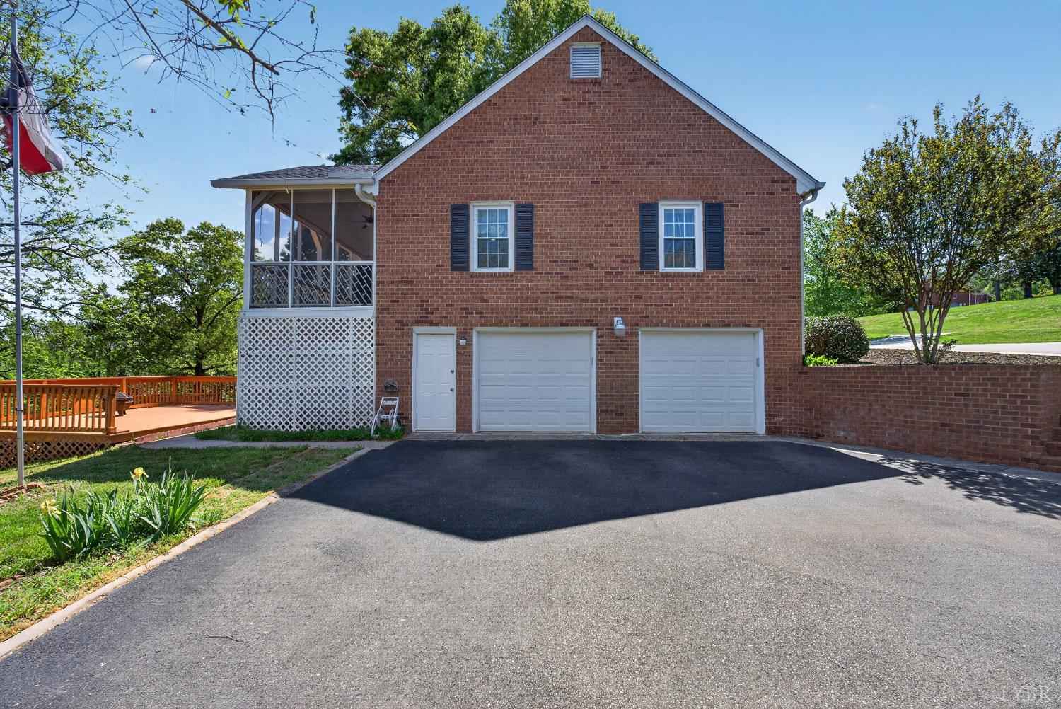 316 Quail Ridge Drive Forest, VA 24551 - Photo 28 of 35 a front view of a house with a yard and garage