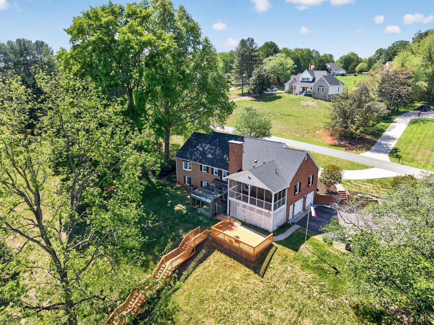 316 Quail Ridge Drive Forest, VA 24551 - Photo 31 of 35 an aerial view of a house with swimming pool and garden view