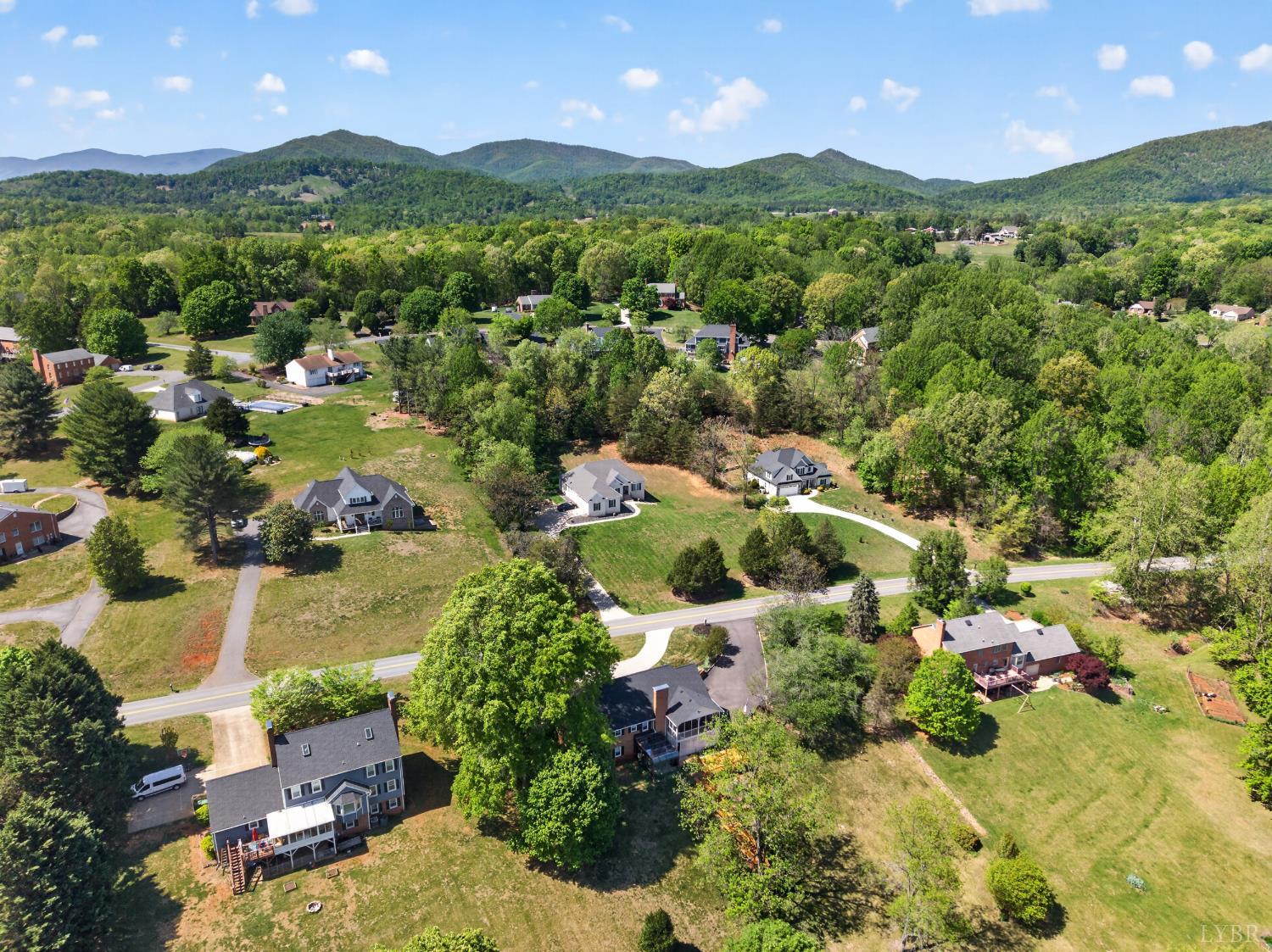 316 Quail Ridge Drive Forest, VA 24551 - Photo 33 of 35 an aerial view of residential houses with outdoor space and swimming pool