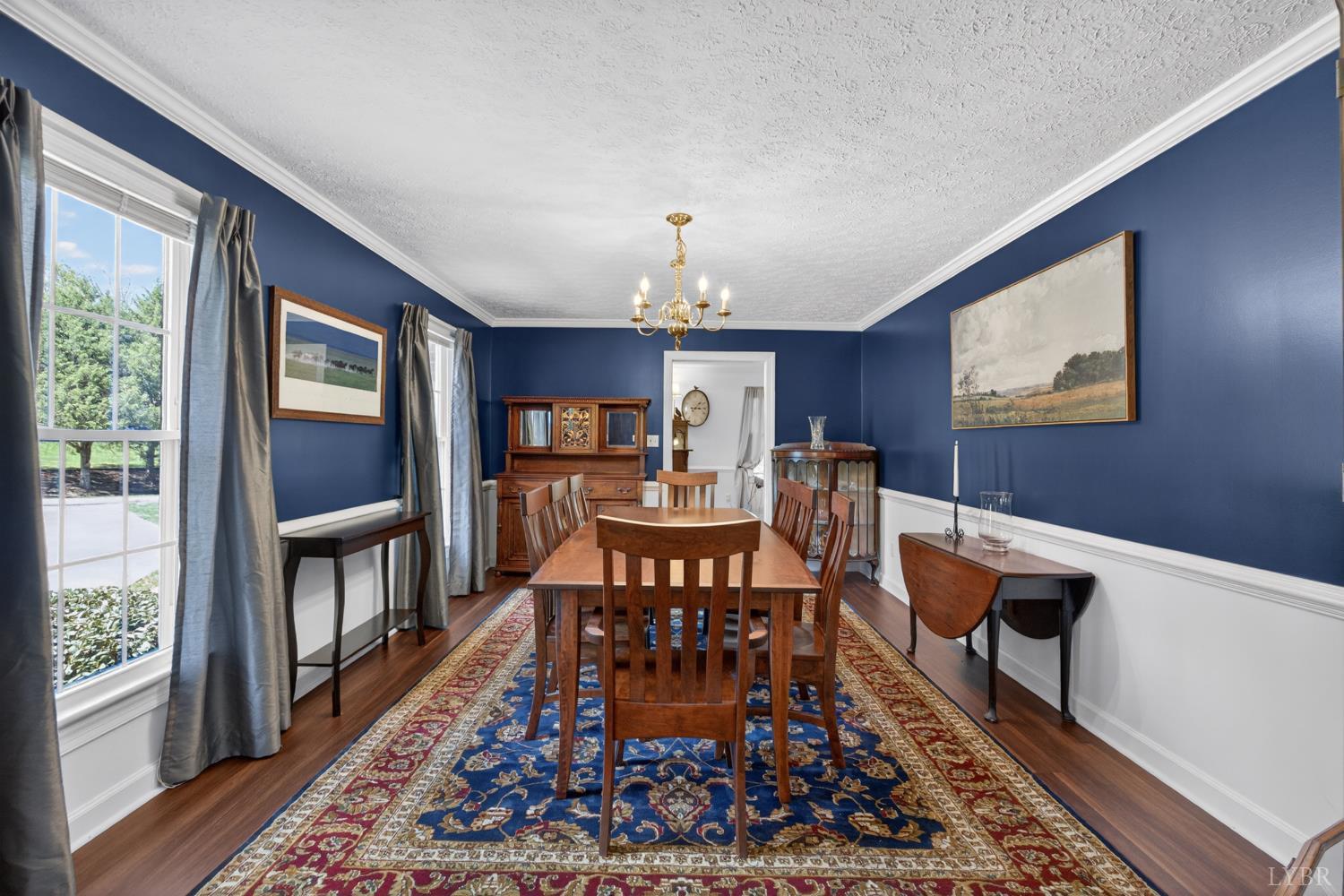 316 Quail Ridge Drive Forest, VA 24551 - Photo 4 of 35 a view of a dining room with furniture window and wooden floor