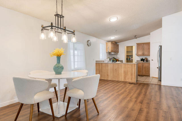 1526 North Dixie Downs Road, Unit 63 St. George, UT 84770 - Photo 8 of 38 DINING AND KITCHEN VIEW