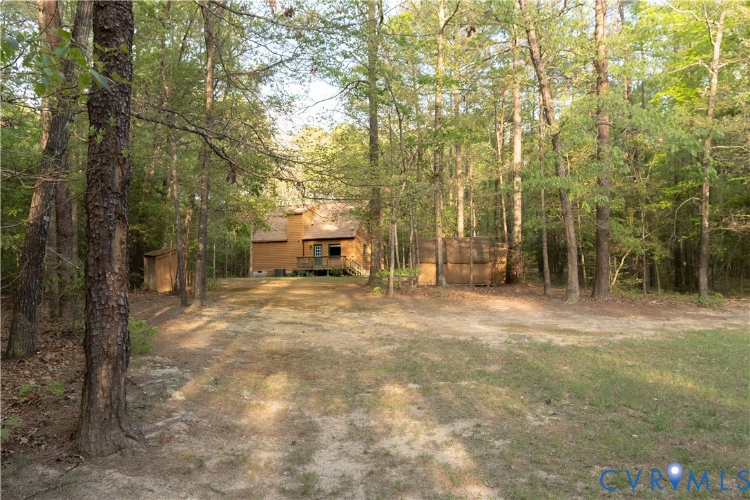 2477 Calno Road Hanover, VA 23069 - Photo 32 of 33 a view of a yard with large trees