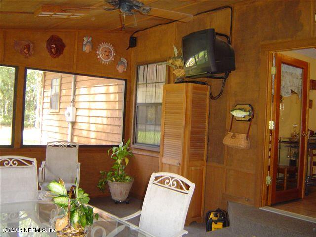4060 Hall And Boree Road Middleburg, FL 32068 - Photo 6 of 8 Screened Rear Porch