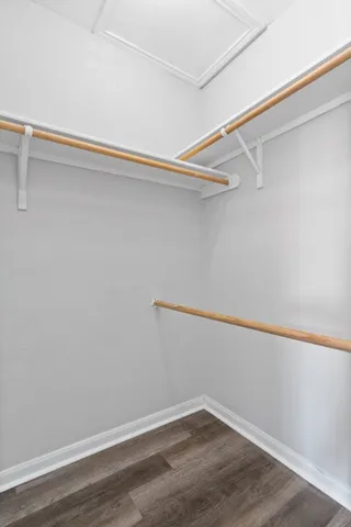 a view of a room with shelf on the wall