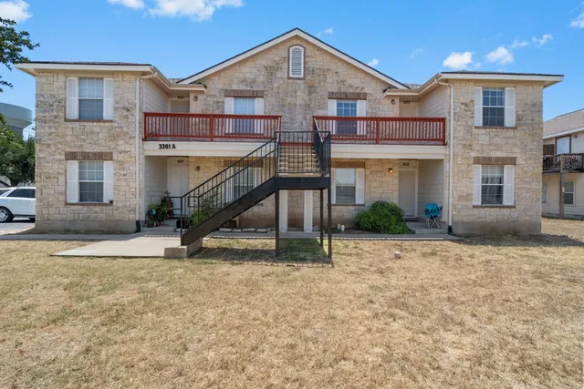 a view of a house with a park