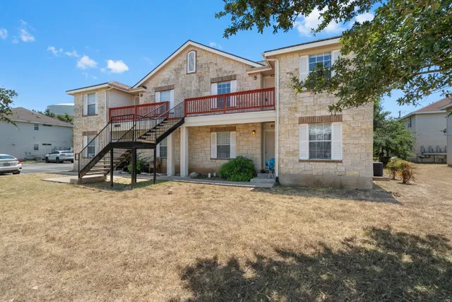a view of a house with a patio