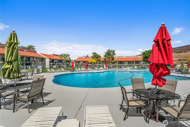 a view of outdoor kitchen and dining room