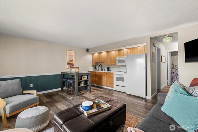 a living room with furniture and a table