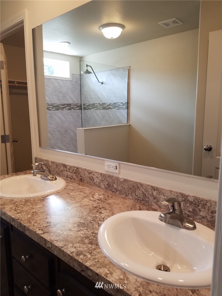 18940 Prairie Street Southwest Rochester, WA 98579 - Photo 14 of 22 a bathroom with a sink and a mirror