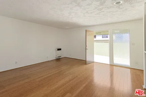 $1,399,000 | 1561 Carmona Avenue, Los Angeles, CA 90019