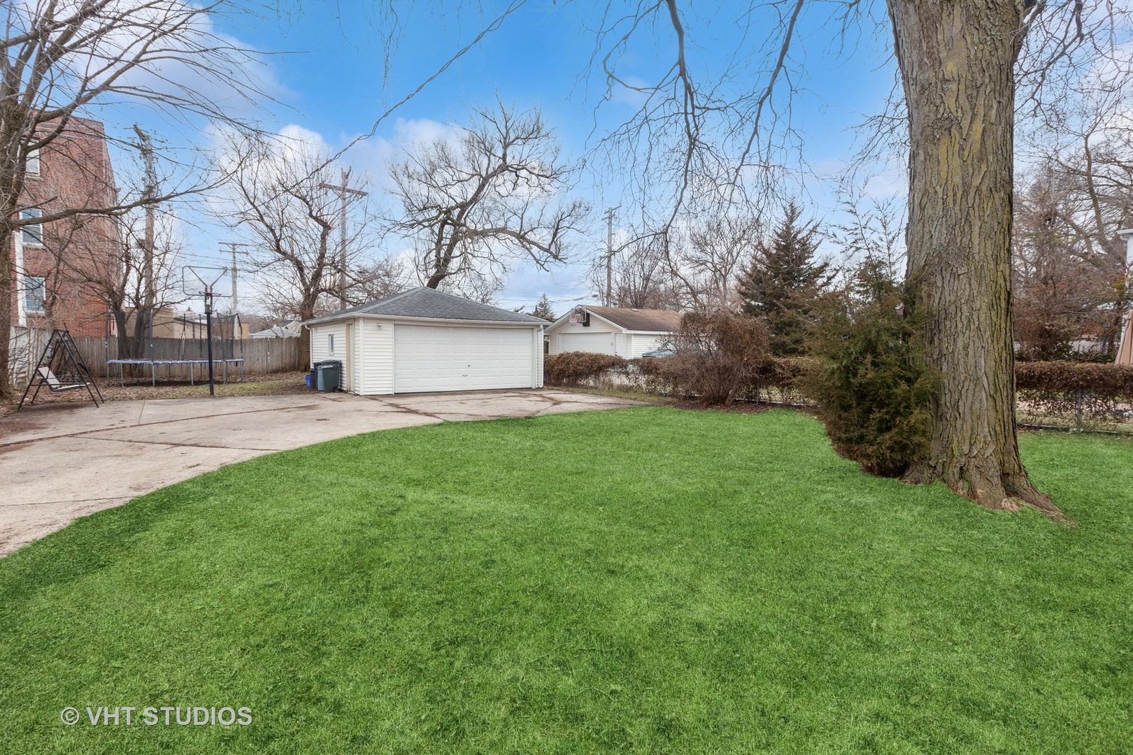 353 East Quincy Street Riverside, IL 60546 - Photo 17 of 21 a view of a house with a yard