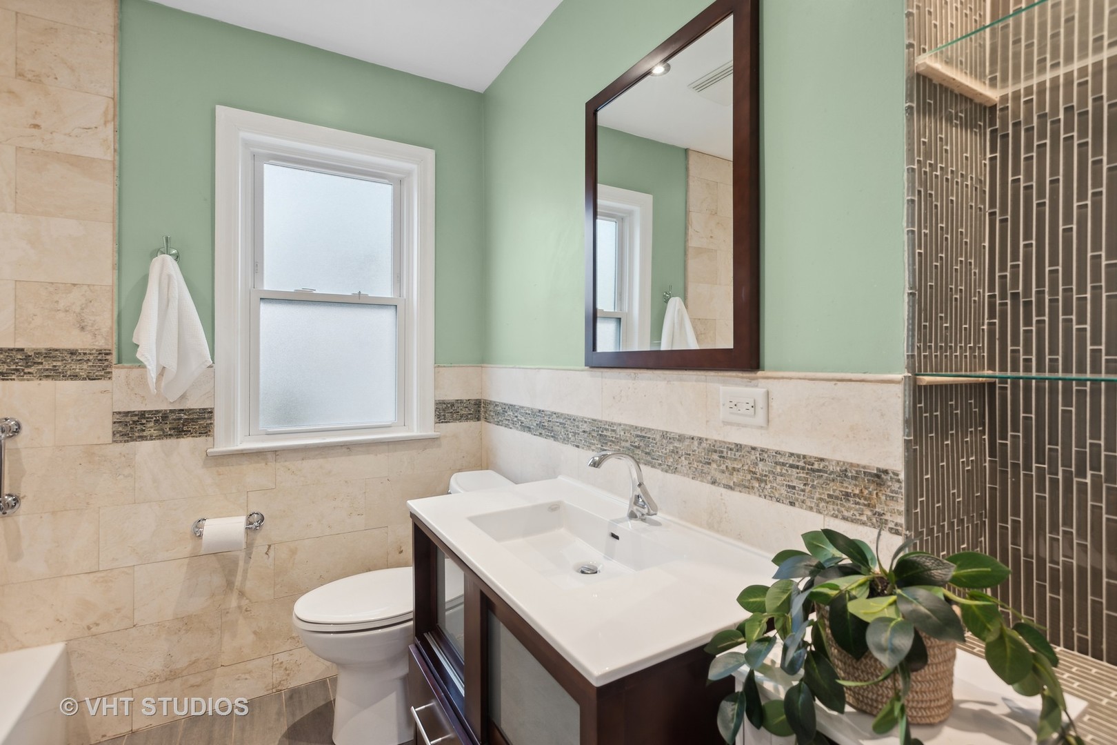 353 East Quincy Street Riverside, IL 60546 - Photo 8 of 21 a bathroom with a sink toilet and mirror