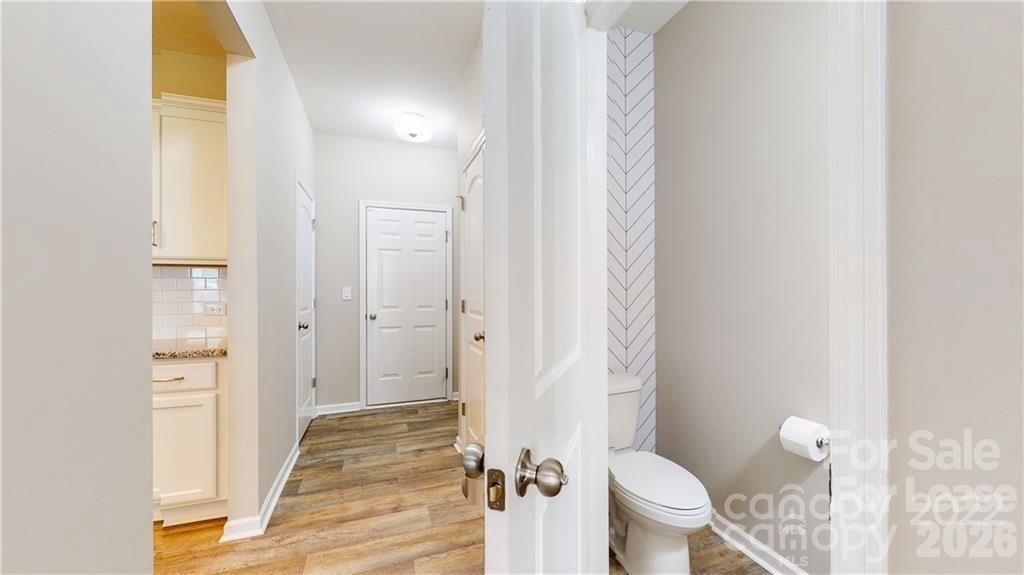 8550 River Ridge Drive Charlotte, NC 28213 - Photo 14 of 25 a bathroom with a sink and toilet