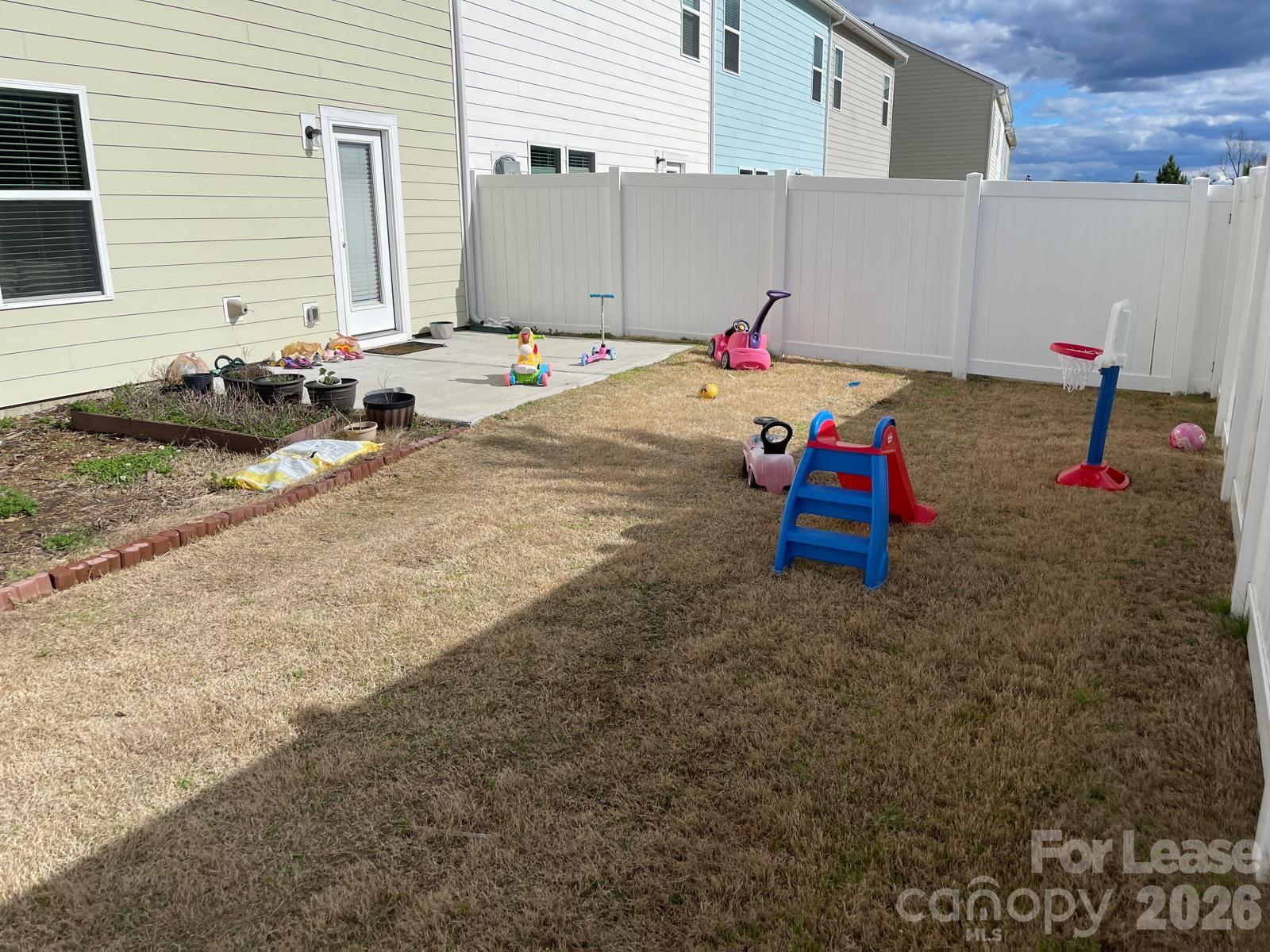 8550 River Ridge Drive Charlotte, NC 28213 - Photo 24 of 25 a view of back yard of the house