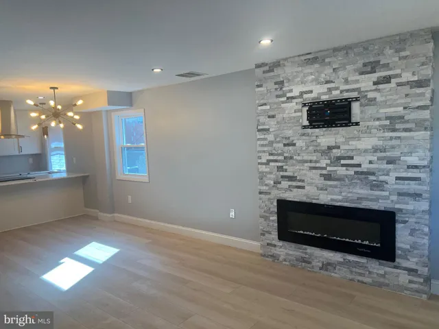 a view of kitchen and hall with furniture