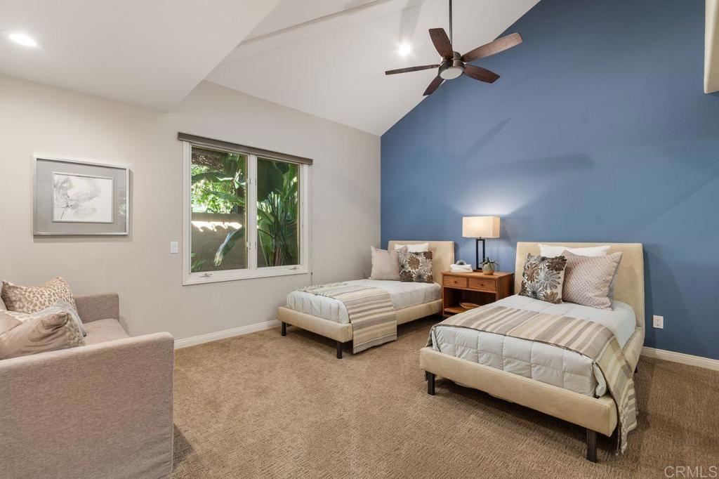 7196 Rancho La Cima Drive Rancho Santa Fe, CA 92067 - Photo 35 of 57 a living room with furniture and a window