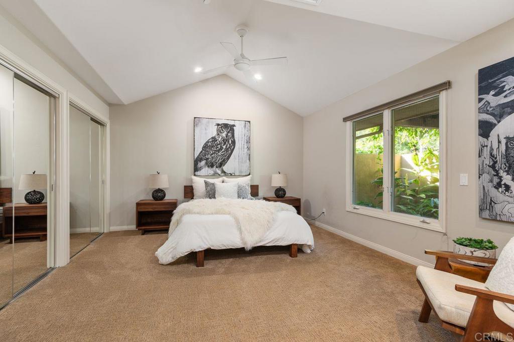 7196 Rancho La Cima Drive Rancho Santa Fe, CA 92067 - Photo 36 of 57 a bed room with a bed and a chair
