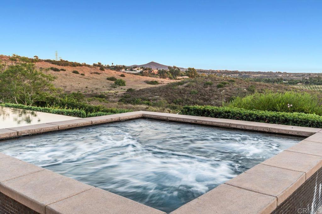 7196 Rancho La Cima Drive Rancho Santa Fe, CA 92067 - Photo 56 of 57 a view of a outdoor space with mountain view