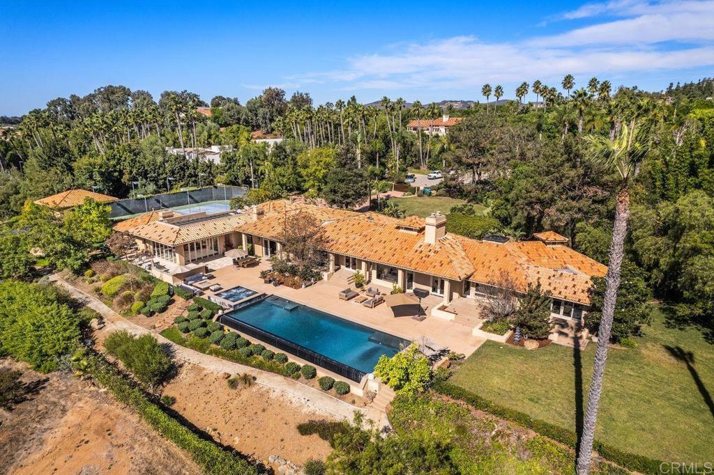 7196 Rancho La Cima Drive Rancho Santa Fe, CA 92067 - Photo 10 of 57 a view of a city with an ocean