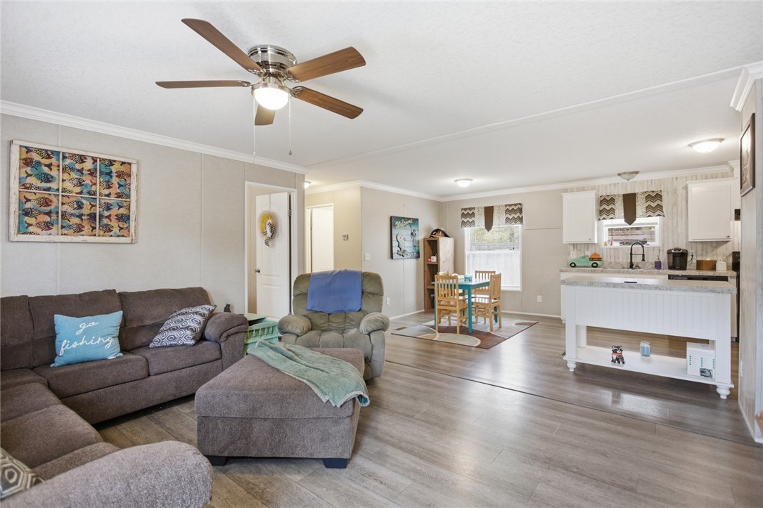 240 Southeast 147 Seneca, SC 29678 - Photo 6 of 26 Bright and inviting living space with an open layout and durable flooring.