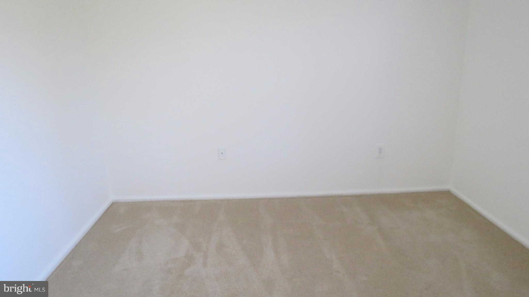 54 Ridge Road, Unit K Greenbelt, MD 20770 - Photo 13 of 29 a view of an empty room