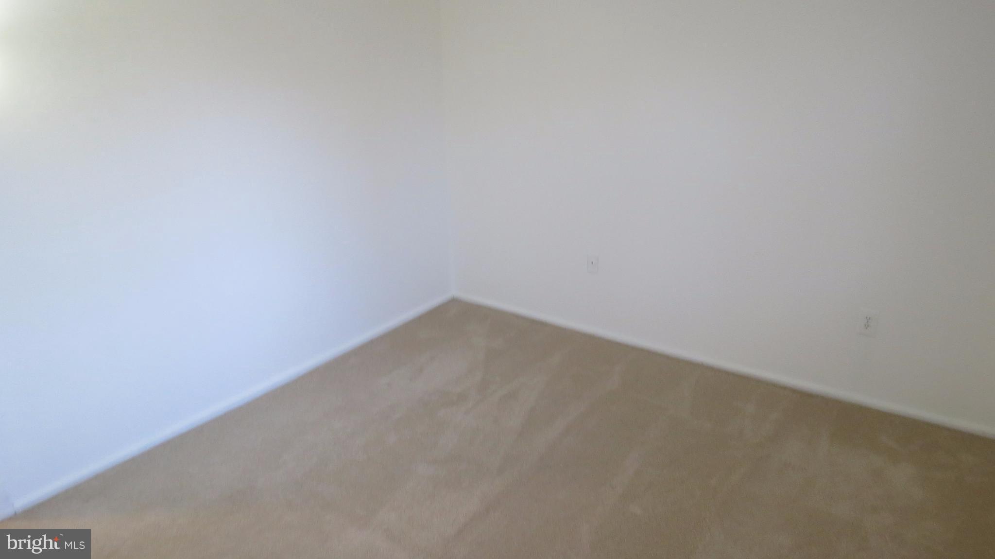 54 Ridge Road, Unit K Greenbelt, MD 20770 - Photo 15 of 29 a view of an empty room