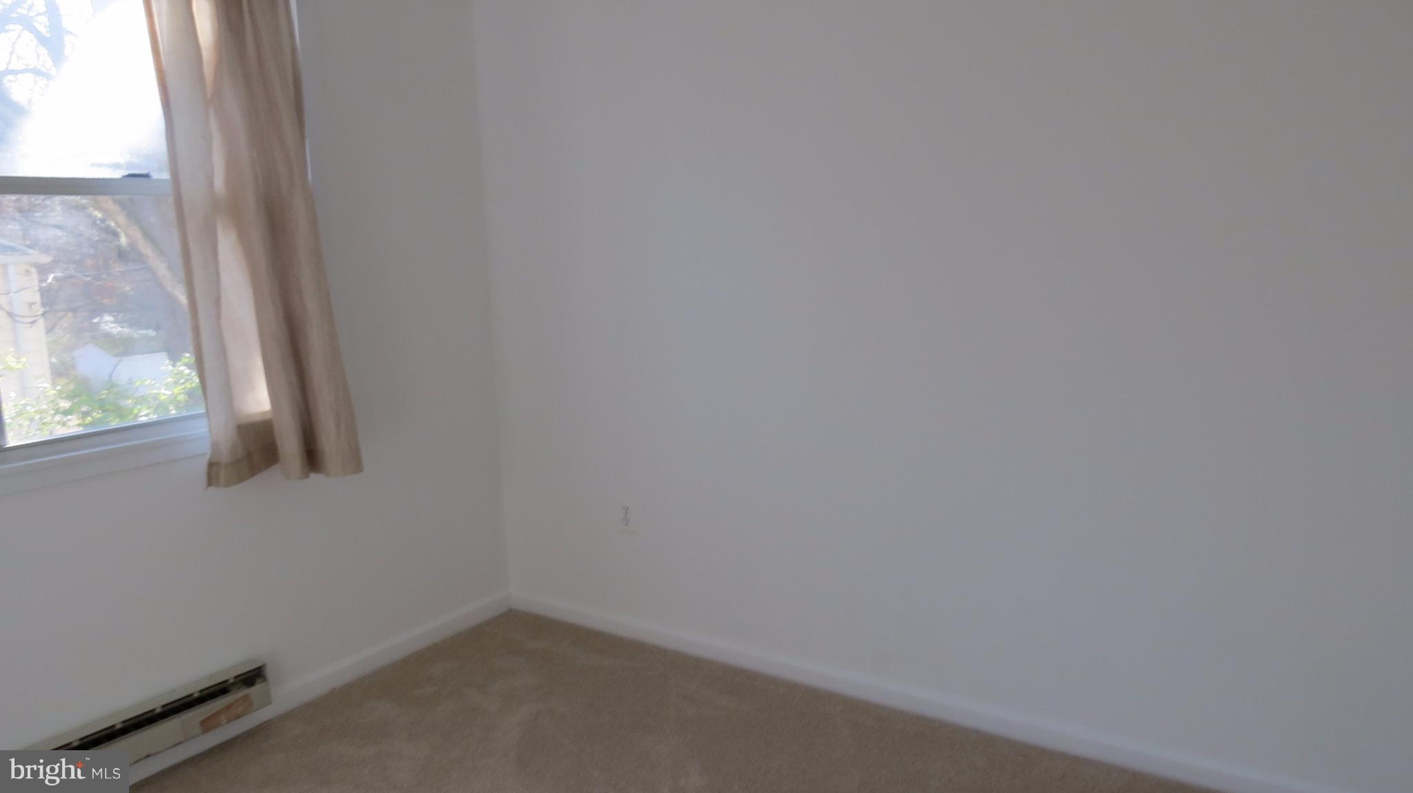 54 Ridge Road, Unit K Greenbelt, MD 20770 - Photo 17 of 29 a small space with a window